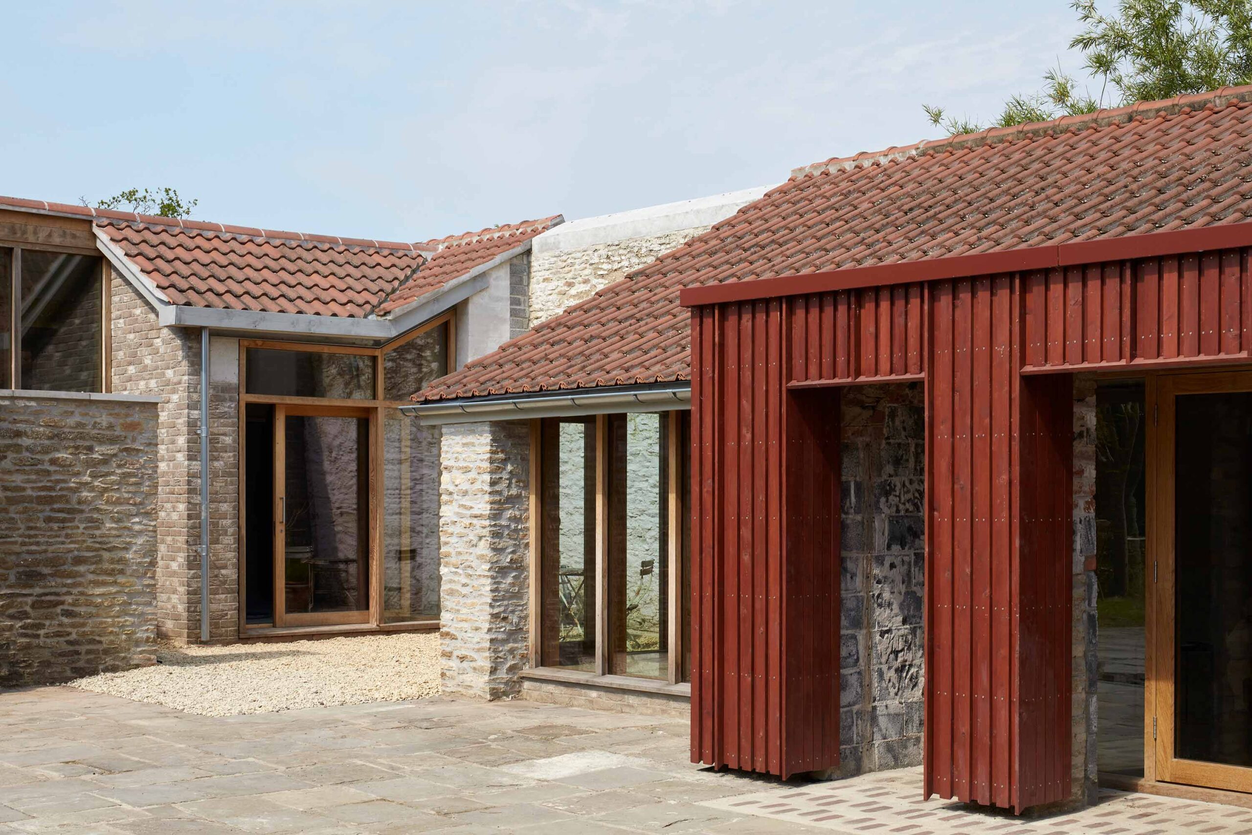 Mini courtyards were inserted into the plan, improving cross ventilation and outdoor access. 